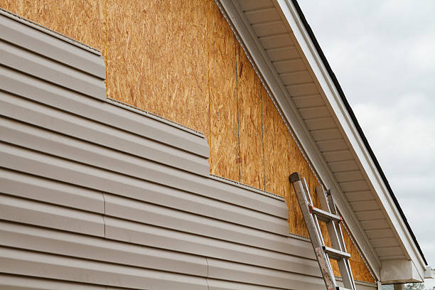 Professional Storm Damage Siding Repair technician working in Gibbsboro, NJ